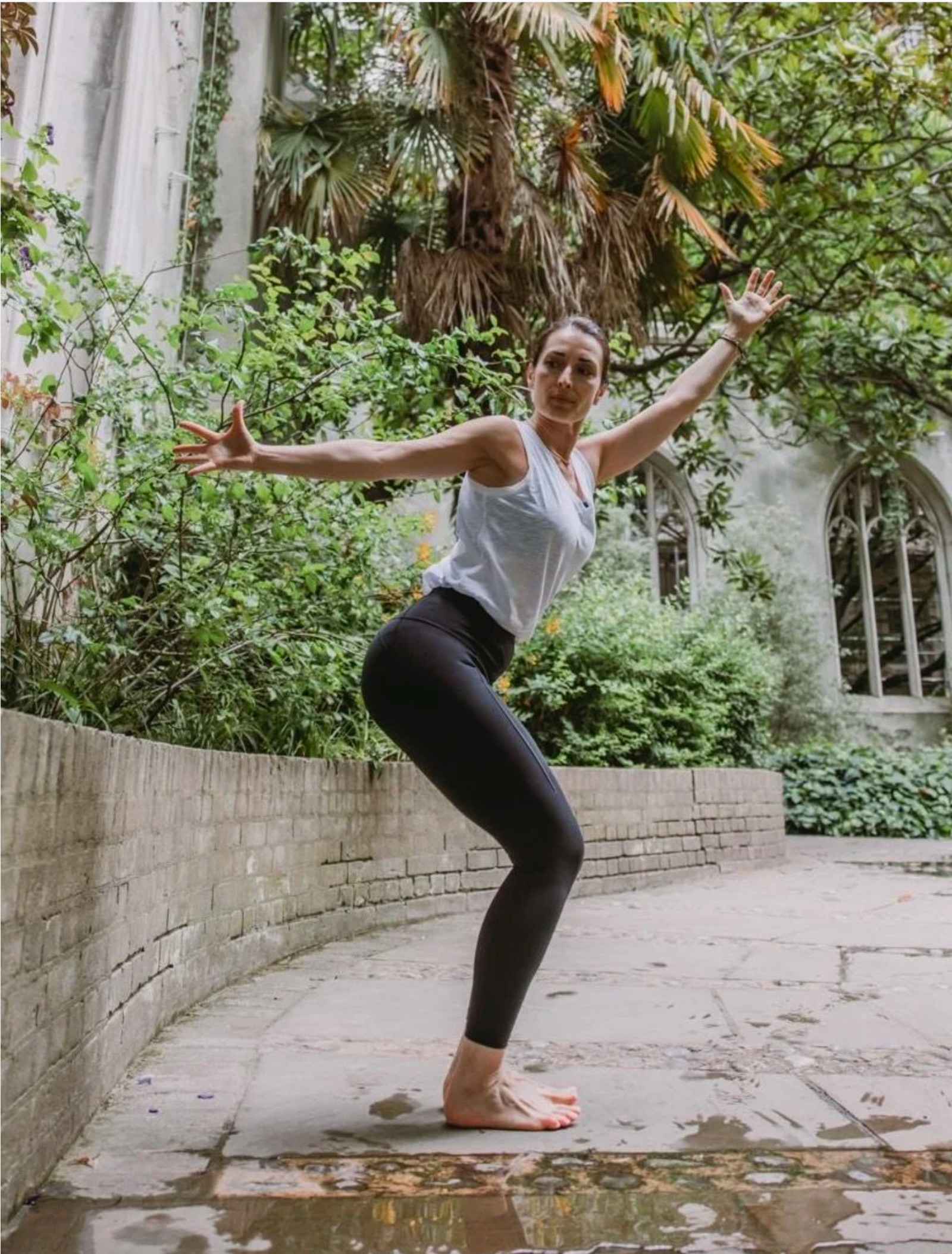 Sonia practising yoga outdoors